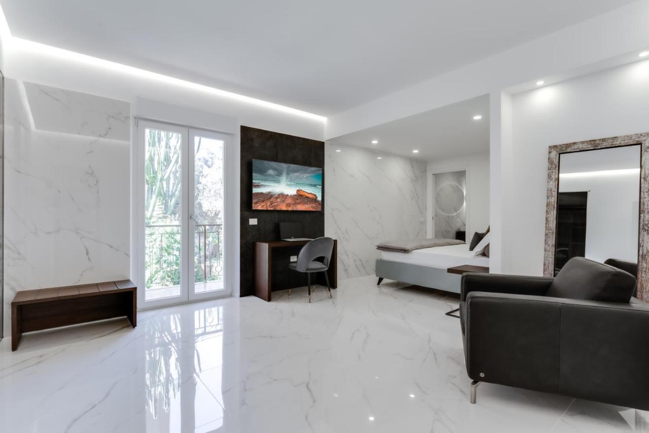 Caralis Suites Rooms Каляри Екстериор снимка