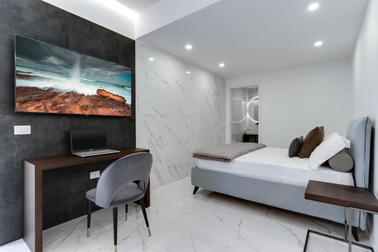 Caralis Suites Rooms Каляри Екстериор снимка